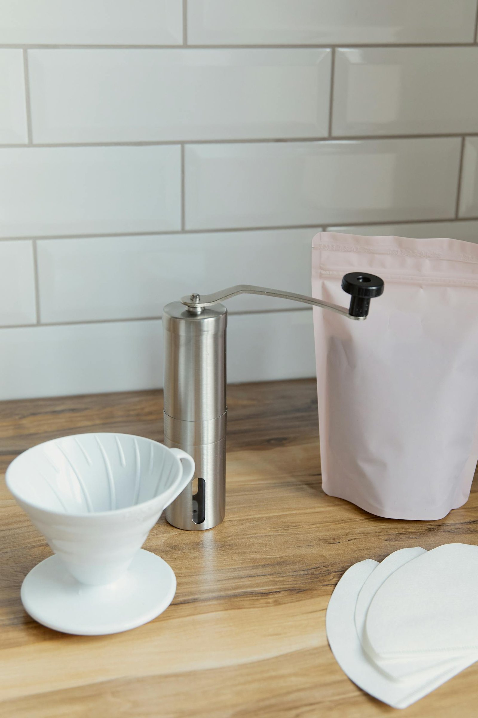 Coffee Grinder and Cup on Kitchen Counter